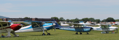 airplanes parked in a field